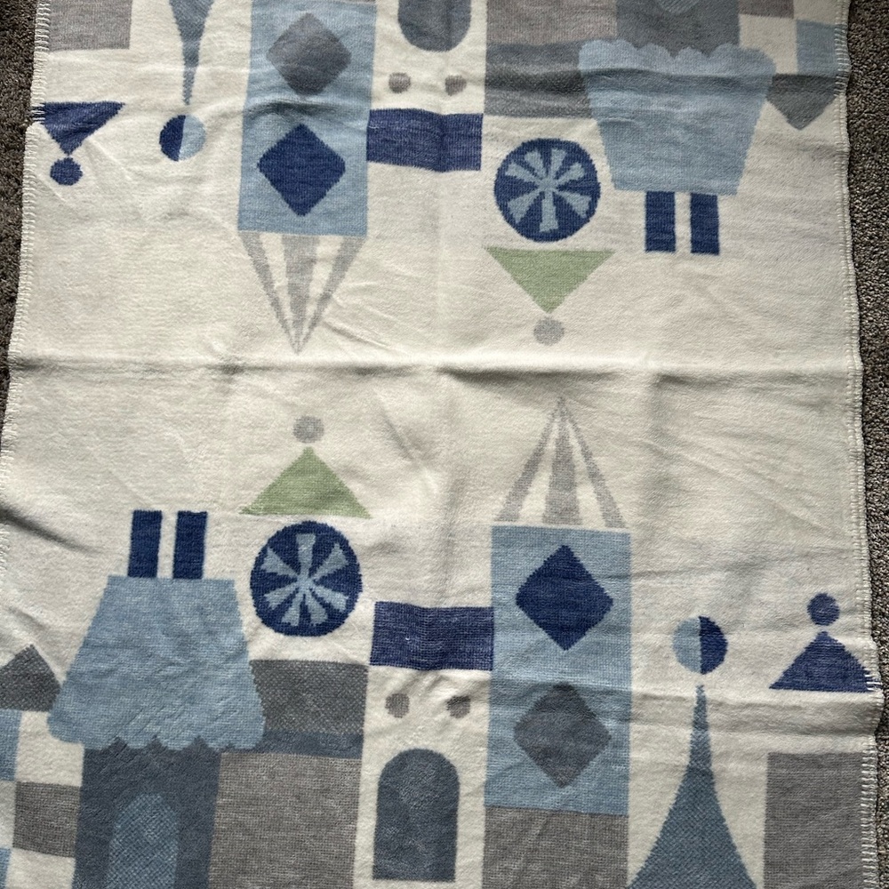 It’s a small world pottery barn kids baby blanket